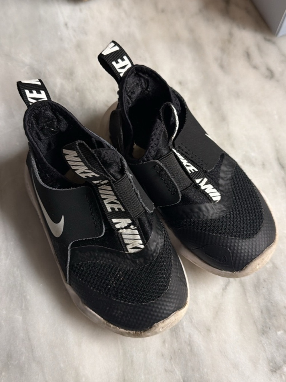 Nike Kids Black Slip-On Sneakers with White Swoosh